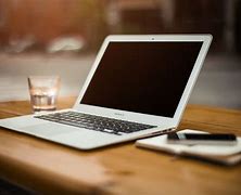 Image result for MacBook On Desk Faded