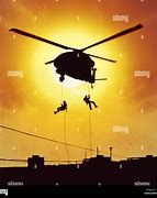 Image result for Rappelling From Huey Helicopter