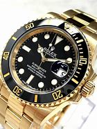 Image result for Submariner Date Black and Gold Rolex