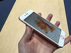 Image result for iPhone 6s Plus in Hand