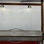 Image result for Corrugated Metal Roof Panels Cricket Detail