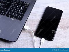 Image result for Plug in Phone Stock Images
