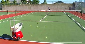 Image result for Tennis Ball Machine Portable