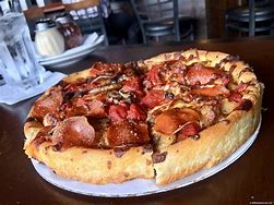 Image result for Pizzeria Uno Deep Dish Pizza