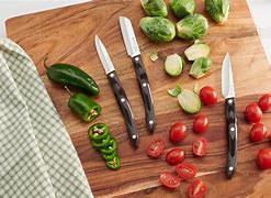 Image result for Chef Knife Cutting Vegetables
