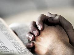 Image result for A Picture of Prayeing with Hand and Bible Book