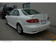 Image result for White Mazda 2003