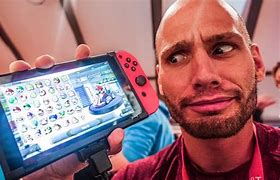 Image result for Nintendo Switch On Rolling TV Stand Party