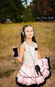 Image result for Little Girl Holding Phone Shutterstock