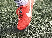 Image result for Purple and Orange Nike Soccer Cleats