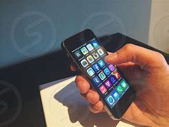 Image result for iPhone 5S in Hand