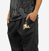 Image result for Black and Gold Jordan Pants