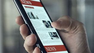 Image result for Reading News On Phone