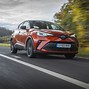 Image result for Toyota Chr Hybrid Orange