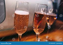 Image result for Champagne Bubbles in a Glass Black Background