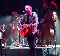 Image result for Rise Against Band On Stage