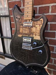 Image result for Cindy Moto Leather Guitar
