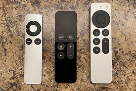 Image result for Apple Remote and Apple TV Box