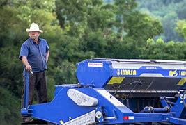 Image result for Farmer in Tractor