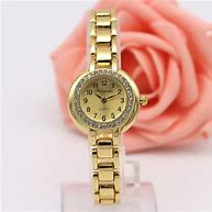 Image result for Guess Woman's Rose Gold Watch
