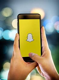 Image result for Person Looking at Snapchat Phone