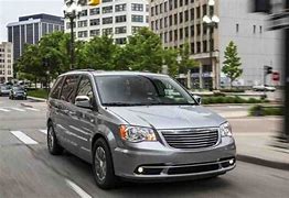Image result for Chrysler Town and Country vs Dodge Caravan