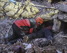 Image result for Earthquake Bodies Trapped Under