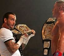 Image result for John Cena and CM Punk 2 WWE Belts