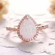 Image result for Wedding Rings Opal Rose Gold