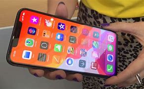 Image result for iPhone 11 with Hand