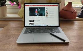 Image result for Surface Laptop Studio On a White Table