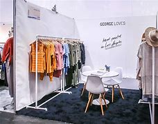 Image result for Clothing Display for Small Booth