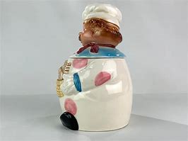 Image result for Baker Holding Basket Cookie Jar
