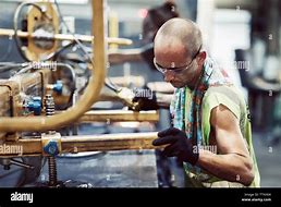 Image result for Hard Working Man On Machinery