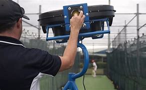 Image result for Inside a Cricket Bowling Machine