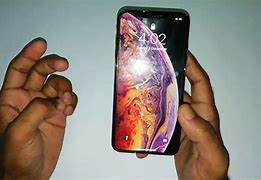 Image result for iPhone XS Max Speaker Holes