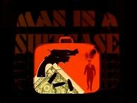 Image result for Man in Suitcase Theme