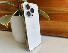 Image result for Gold iPhone 14 Pro Max with a White Case