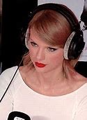 Image result for Taylor Swift and Book and Headphones Wallpaper