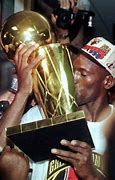 Image result for Michael Jordan Iconic Photo with Trophie