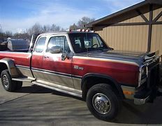 Image result for 1st Gen Dodge Dually Red Lifted