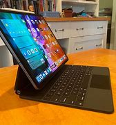 Image result for iPad Pro Magic Keyboard On Lap