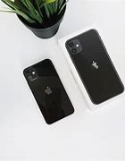 Image result for Black iPhone 11 On Table