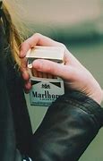 Image result for Girl Smoking Marlboro Gold