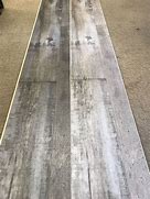 Image result for Barnwood Look Interlocking Vinyl Plank Flooring