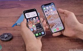 Image result for iPhone 11 vs 12 Mini in Hand