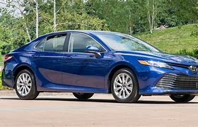 Image result for Toyota Camry Le Hybrid Interiror