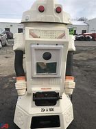 Image result for Coin Ride Robot