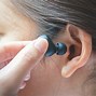 Image result for Women Talking Earbud Phone