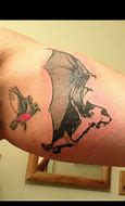 Image result for Batman and Robin Tattoo with Cat Ears and Paws